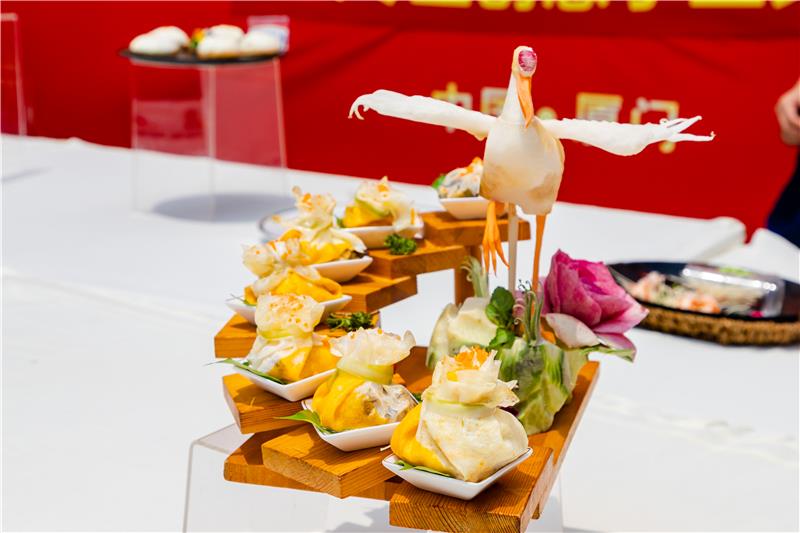 ��������~